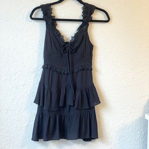 The Impeccable Pig Black Ruffle Sleeve Dress